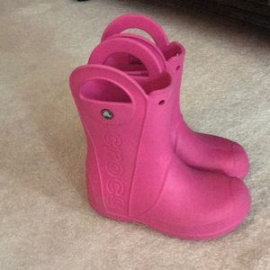 Girls pink Crocs boots